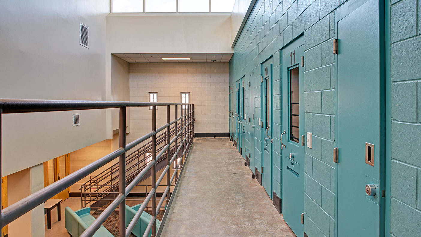 The center features five housing units designed for 12-14 juveniles in single rooms within a direct supervision setting. 