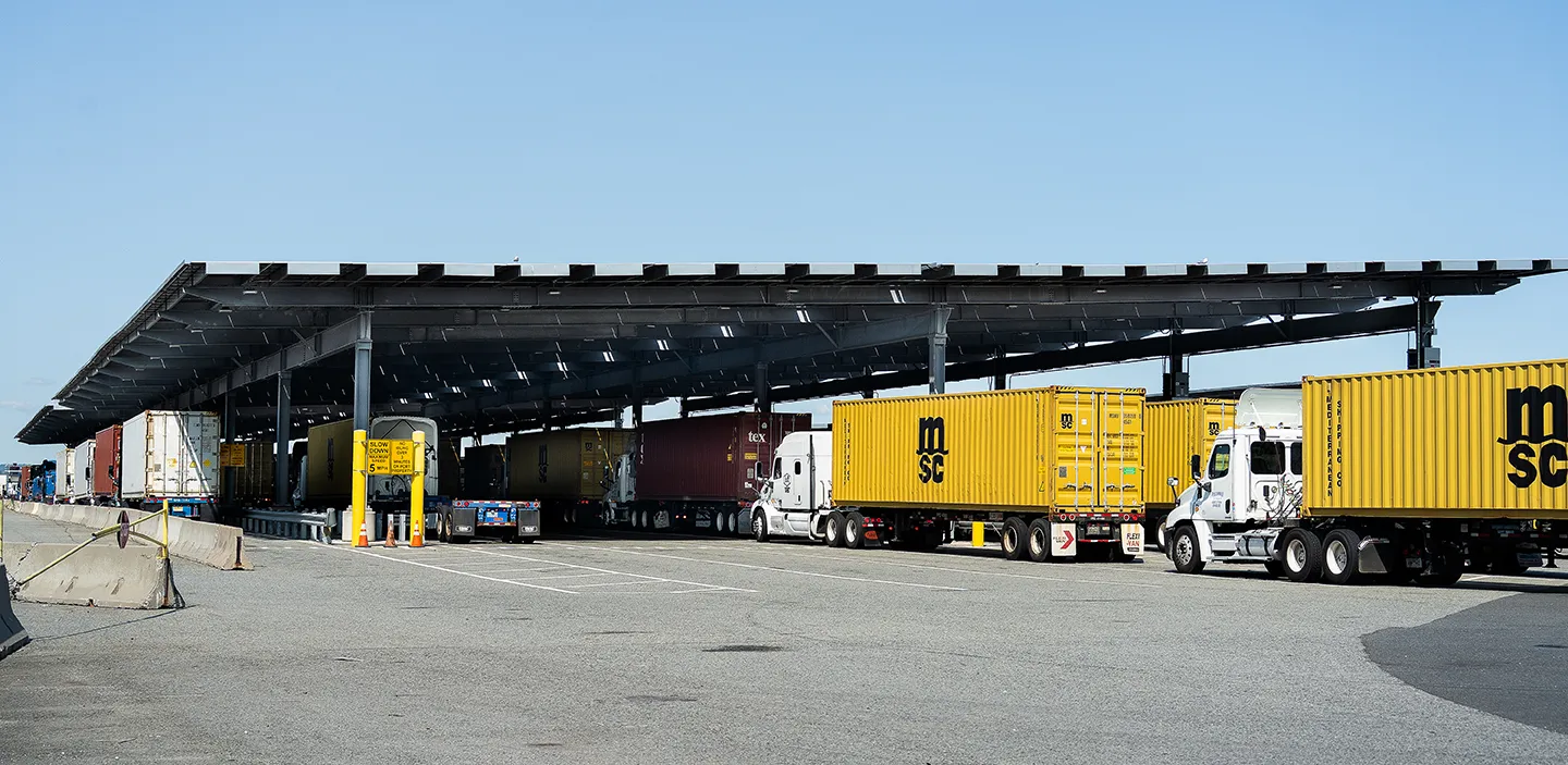 The 7.2-megawatt (MW) solar generation is divided between 3.8 MW of elevated canopy-mounted arrays over active truck lanes and 3.4 MW of additional rooftop and parking canopy arrays.
