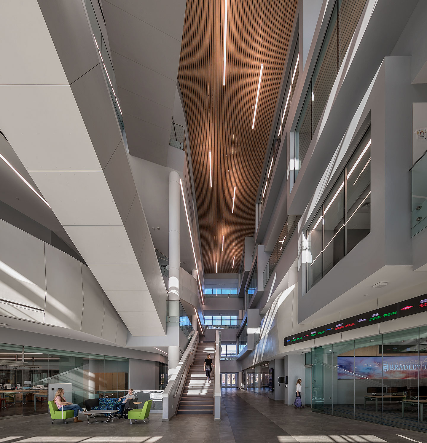 Designed using a modern interpretation of collegiate gothic architecture, the 390,000-SF facility includes more than 60 classrooms, three auditoriums, social space for students and faculty, breakout rooms, conference space, and a café.