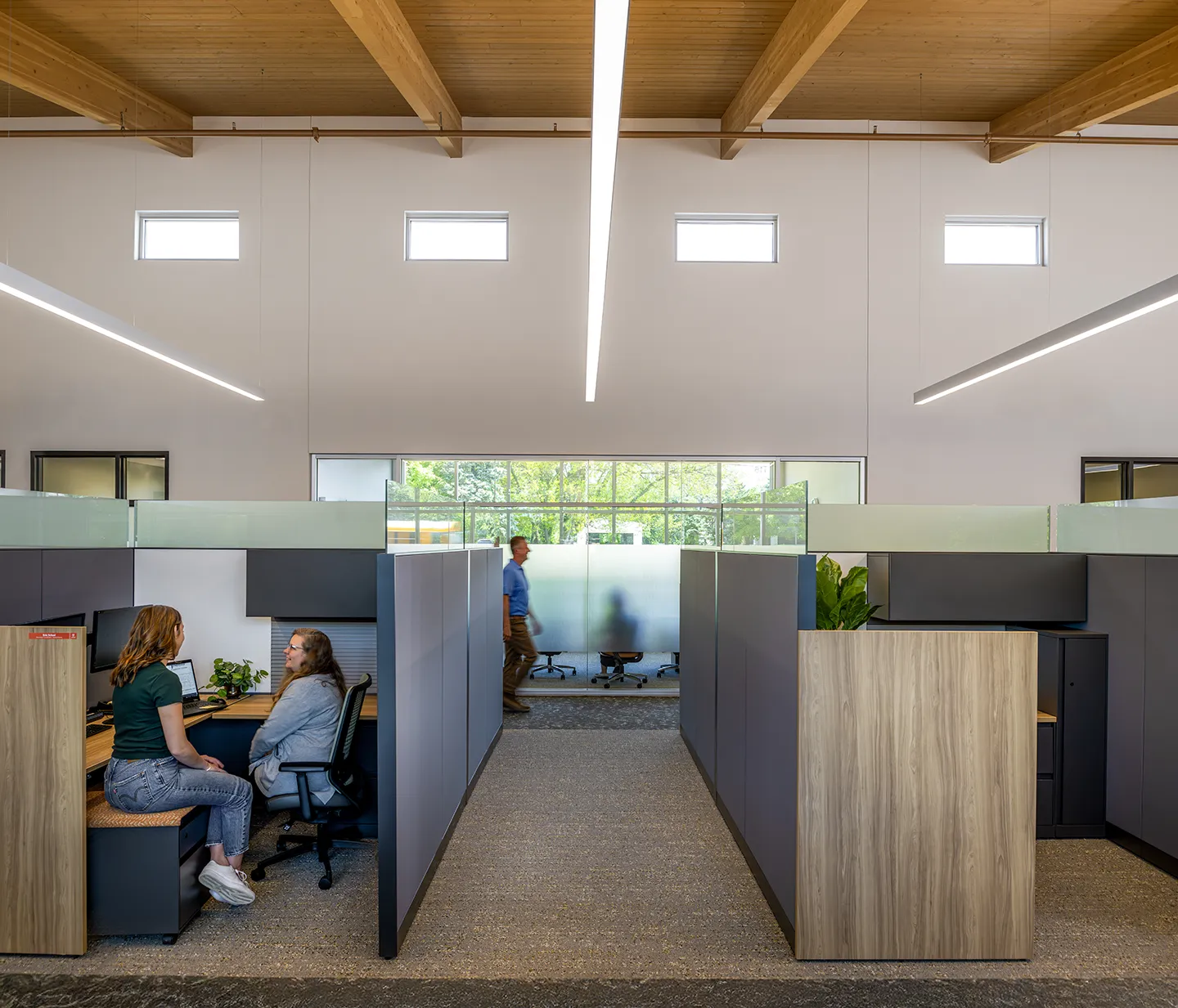 All the workstations and offices are within 25 feet of exterior glazing and natural light sources.