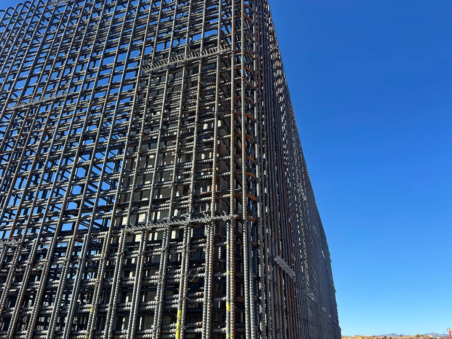 Beginning of construction on the wastewater treatment plant. The significant amount of rebar required for the water holding structures is necessary to provide design strength and prevent shrinkage.